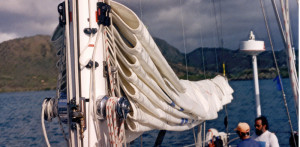 Neatly flaked main sail on boat